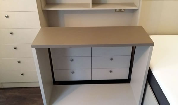 Pull-out desk with chest of drawers