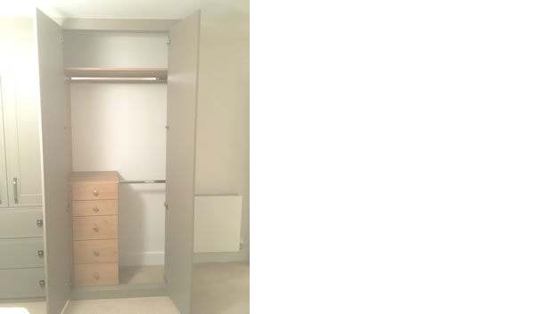 Hanging space, shelves and chest of drawers