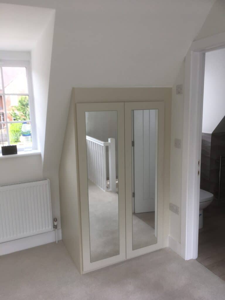 Bespoke wardrobe with mirror doors