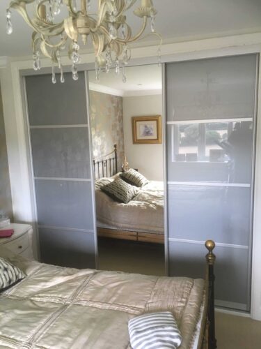 Sliding Panel Door Wardrobe with central mirror door