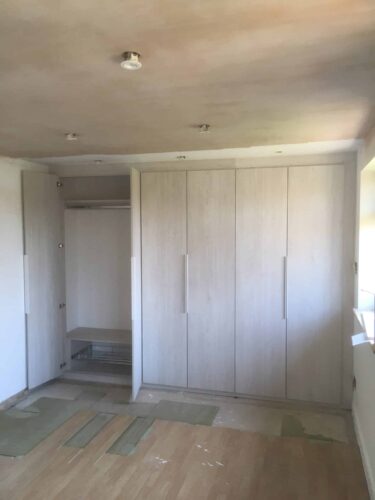 3 Hinged Double Wardrobes in White Nordic Wood with Venice style doors.