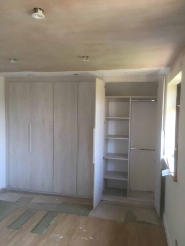 3 Hinged Double Wardrobes in White Nordic Wood with Venice style doors.