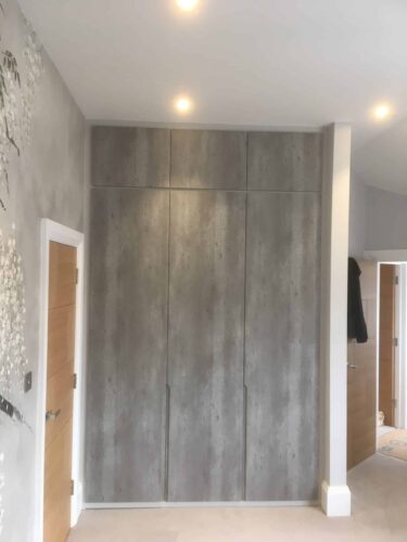 Wardrobes in 4 bedrooms in Light Grey with doors in London Concrete with Integra style.