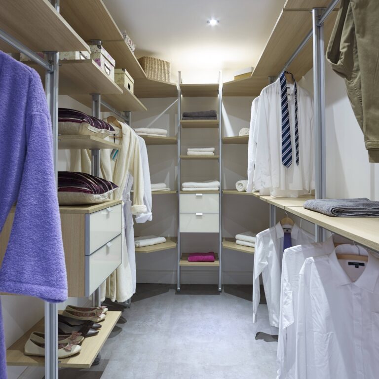 A walk-in wardrobe using the wall pole system.