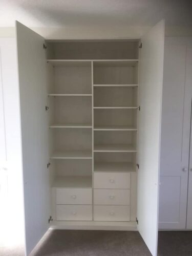 Shelving combined with drawers.