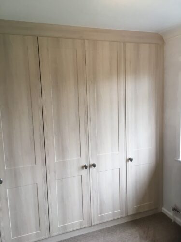 Two double and one single fitted wardrobesa