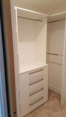 Bespoke walk in wardrobe with hanging space, chest of drawers