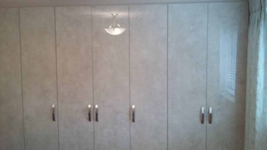 Ultragloss Limestone Wardrobe. 3 doubles & 2 singles robes.