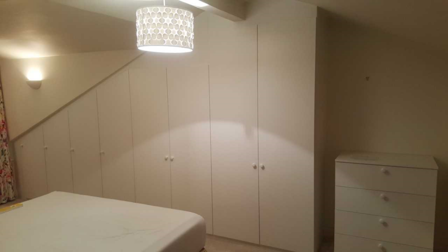 Bespoke angled hinged door wardrobe