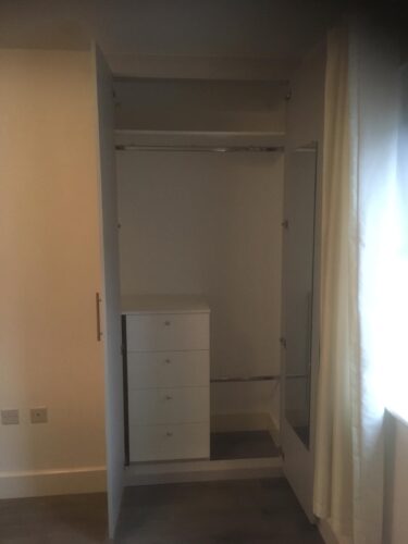 Hanging space, shelf and chest of drawers