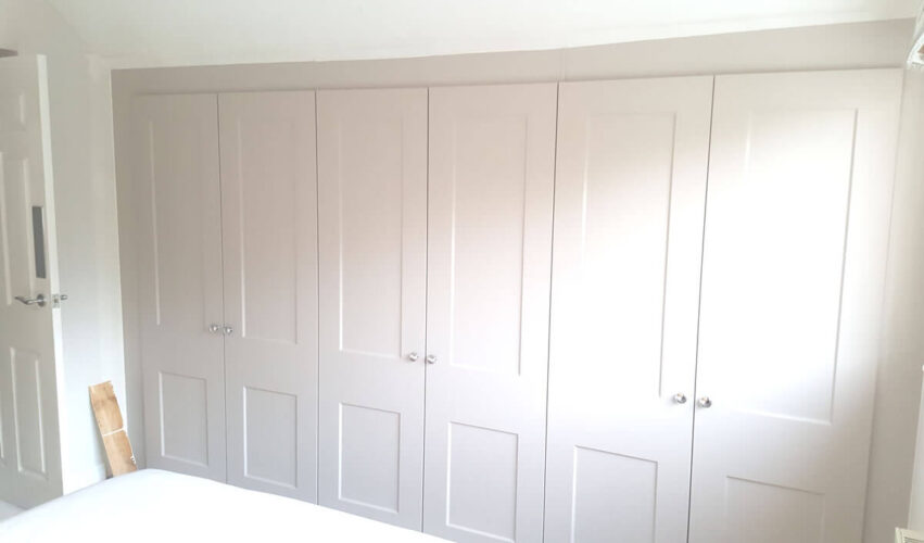 Three hinged wardrobes