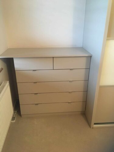 Matching chest of drawers with extended top.